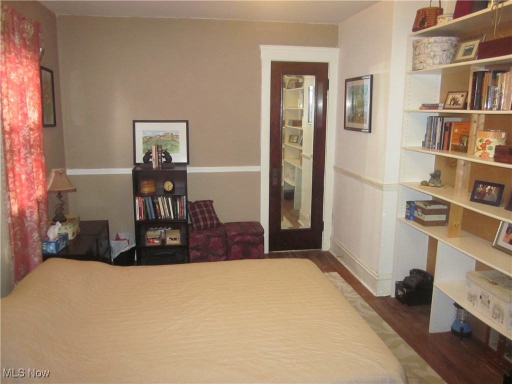 10035 Baltic Road Cleveland, OH 44102 - Photo 23 of 41 Bedroom featuring dark hardwood / wood-style floors