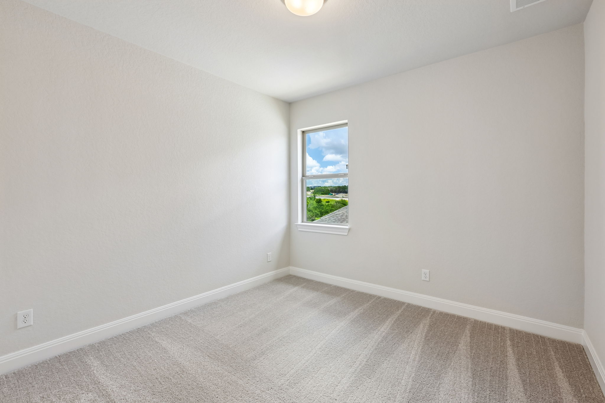 214 Prickly Poppy Loop Kyle, TX 78640 - Photo 27 of 38 an empty room with windows