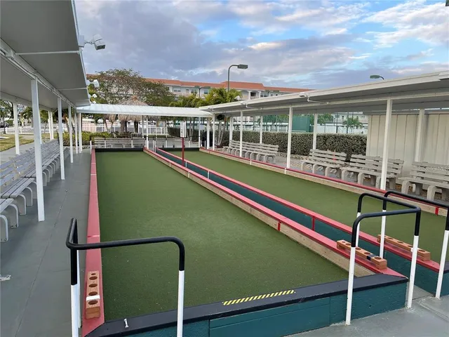 a view of a swimming pool with a lounge chairs