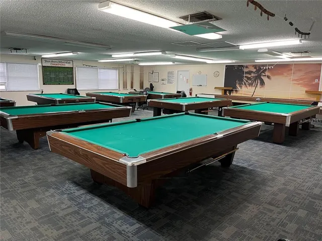 an aerial view of a house with outdoor space ocean view