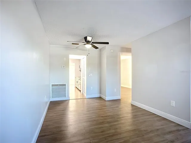 a kitchen with granite countertop a stove and a sink