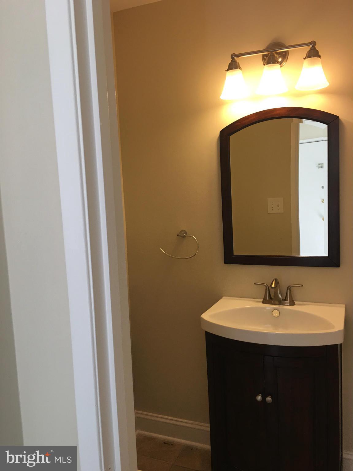 2380 Southgate Square Reston, VA 20191 - Photo 8 of 14 Half bath on main level. Updated fixtures!