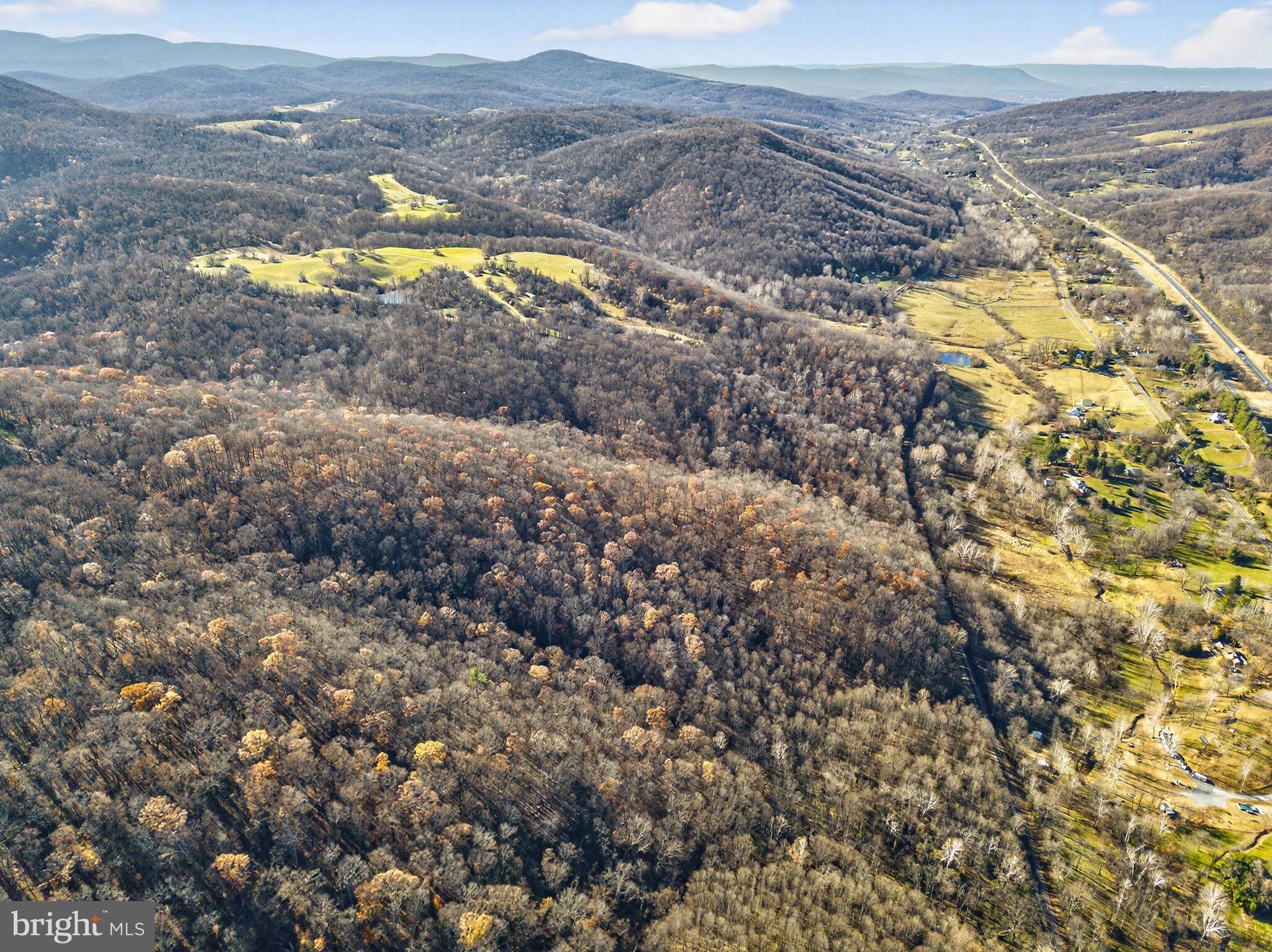 Fiery Run Road Linden, VA 22642 - Photo 5 of 24 a view of a lake with mountains in the background