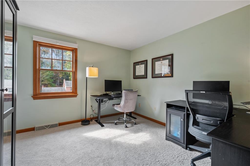 122 Rippling Brook Drive Sewickley, PA 15143 - Photo 21 of 31 a view of a workspace with furniture and a window