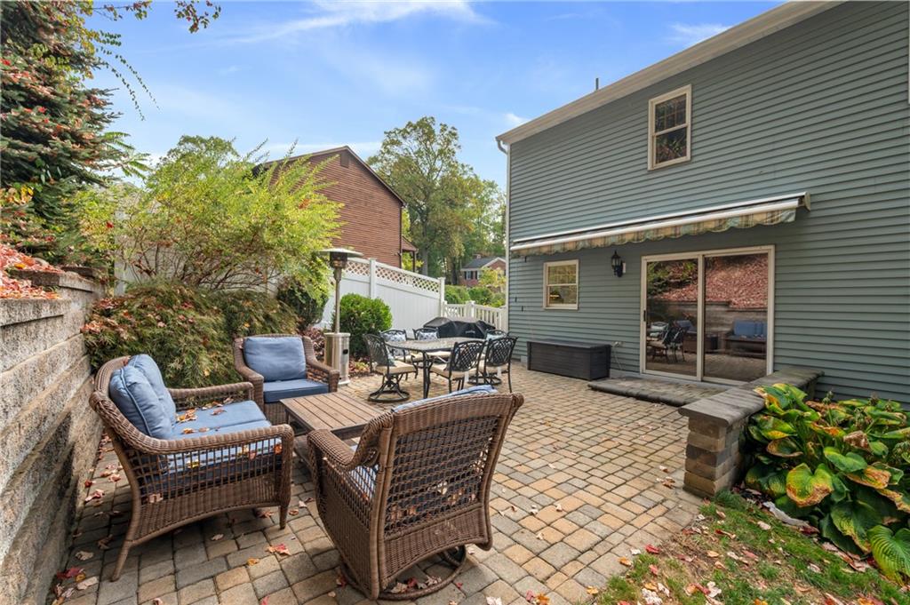 122 Rippling Brook Drive Sewickley, PA 15143 - Photo 28 of 31 a view of a house with backyard and sitting area