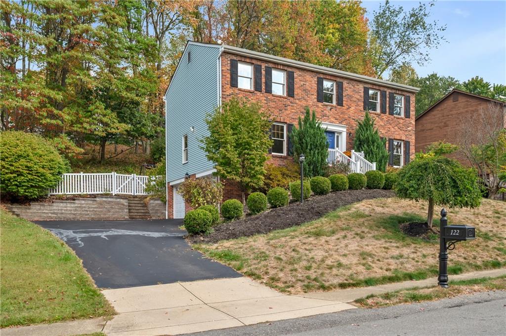 122 Rippling Brook Drive Sewickley, PA 15143 - Photo 31 of 31 a front view of a house with garden