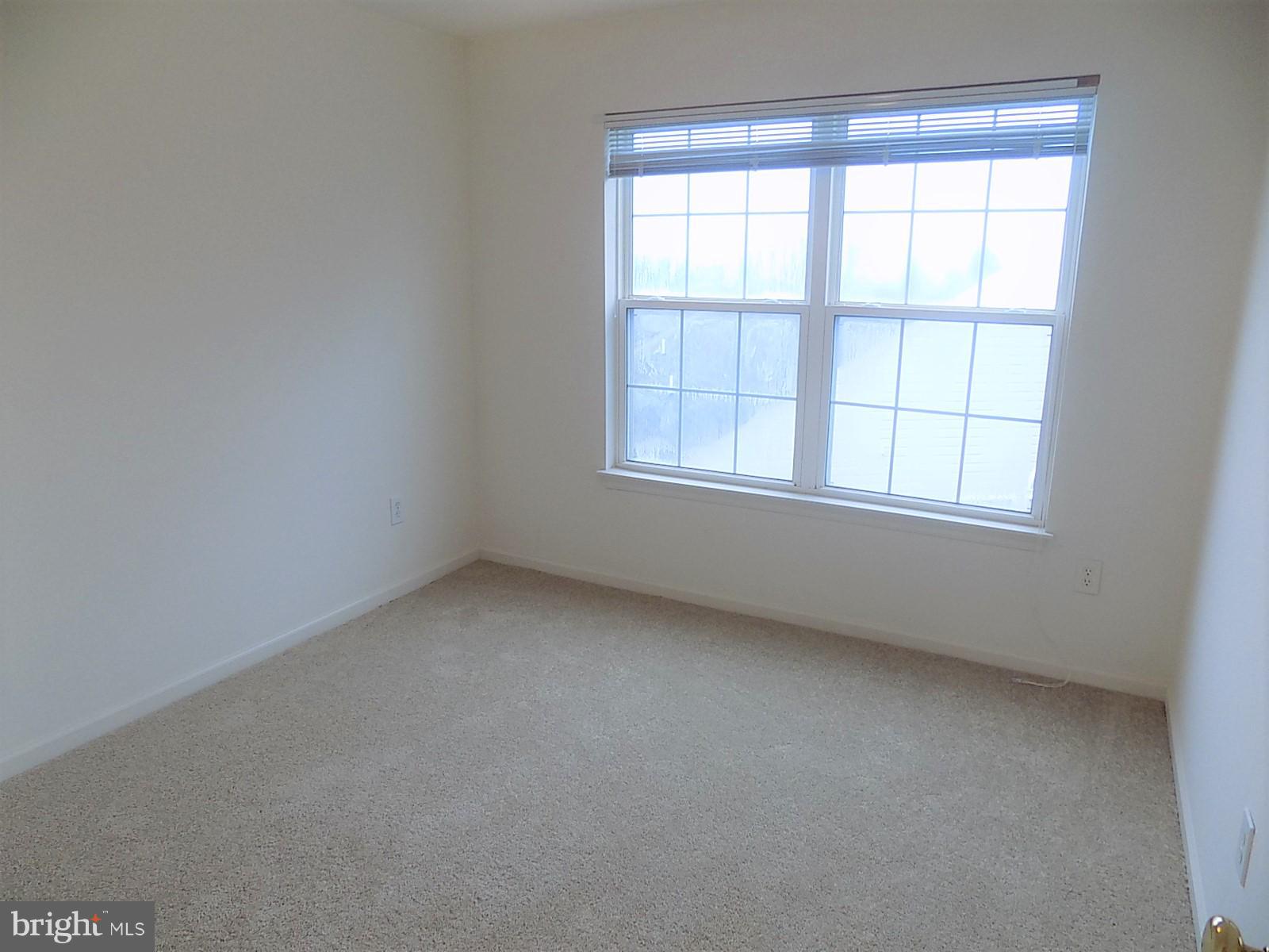 9 Summit Ridge Court Germantown, MD 20874 - Photo 20 of 29 Bedroom 3- side window view