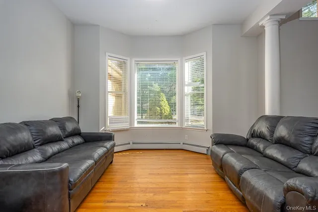 a living room with furniture and a couch