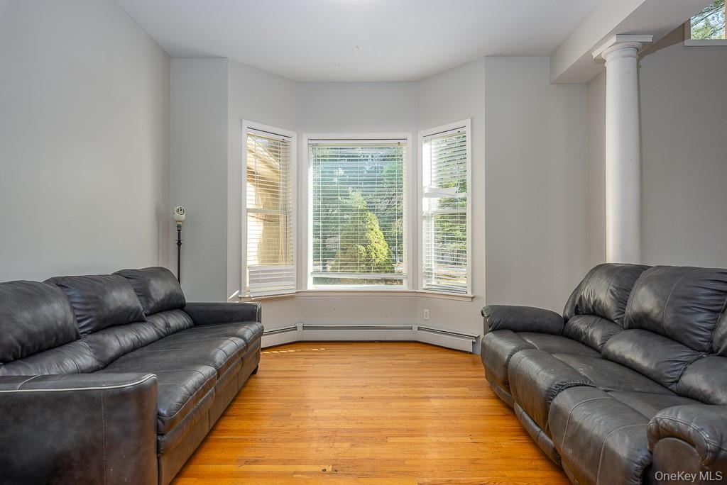 85 York Road Bloomingburg, NY 12721 - Photo 12 of 32 a living room with furniture and a couch