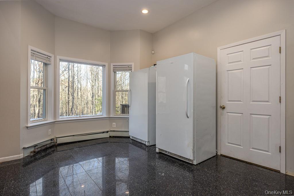 85 York Road Bloomingburg, NY 12721 - Photo 16 of 32 a view of an empty room with a window