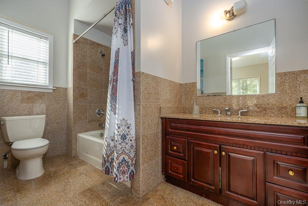 85 York Road Bloomingburg, NY 12721 - Photo 20 of 32 a bathroom with a sink a toilet and shower