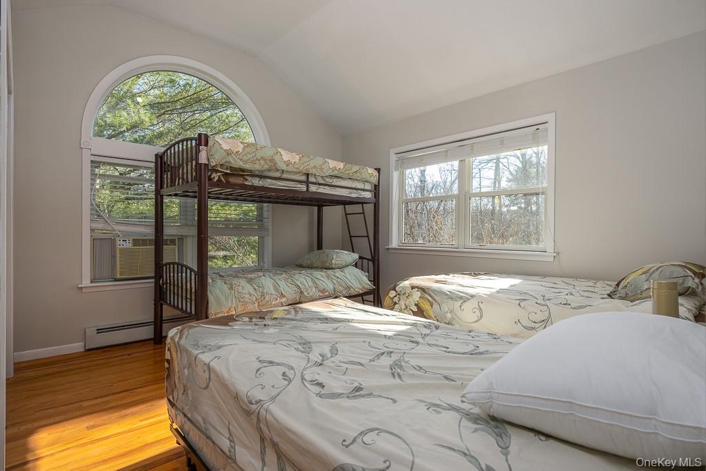 85 York Road Bloomingburg, NY 12721 - Photo 27 of 32 a bedroom with a bed and a large window