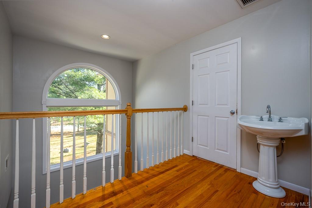 85 York Road Bloomingburg, NY 12721 - Photo 30 of 32 a bedroom with a bed and a table