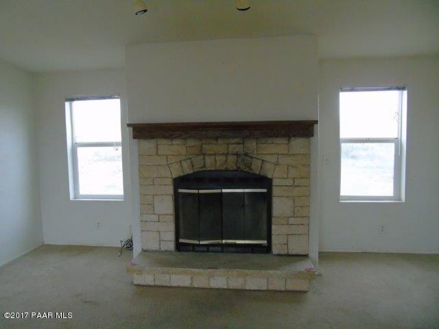 2480 East View Ridge Road Rimrock, AZ 86335 - Photo 6 of 20 a living room with a fireplace