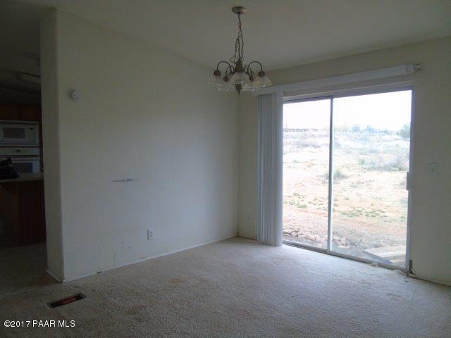 2480 East View Ridge Road Rimrock, AZ 86335 - Photo 8 of 20 a view of an empty room with a window