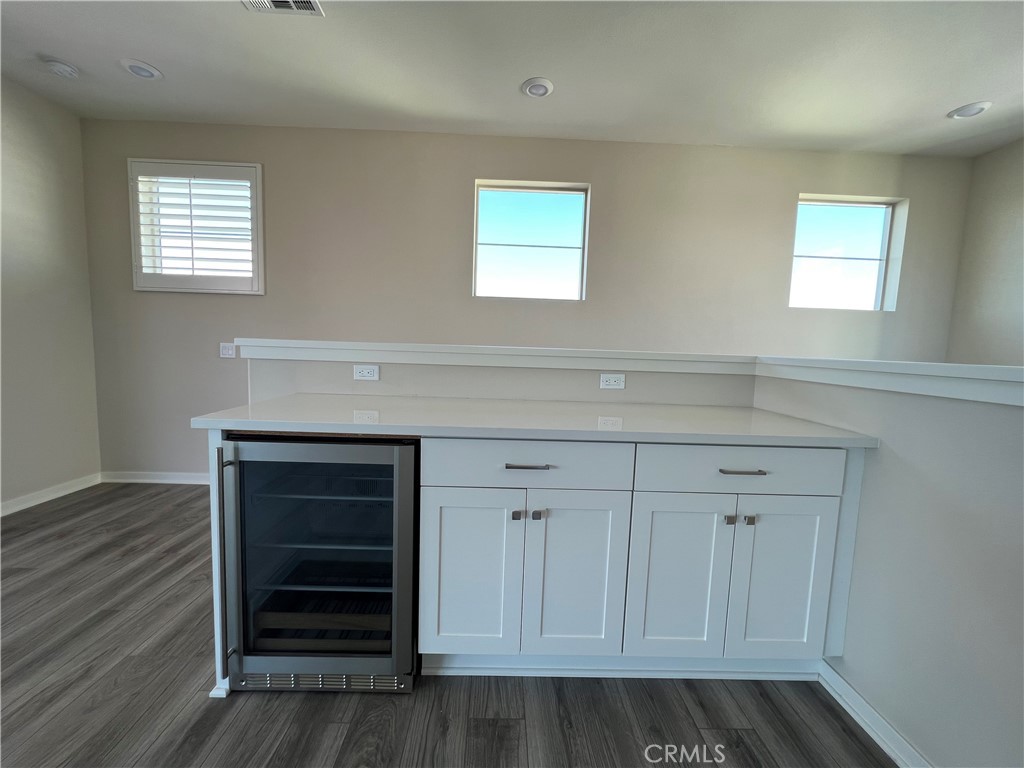 110 Sculpture Irvine, CA 92618 - Photo 33 of 37 a kitchen with granite countertop white cabinets and sink