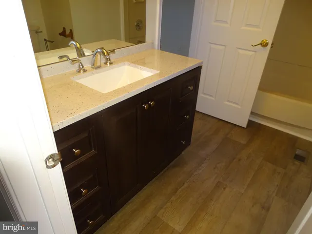 a bathroom with a toilet and a sink