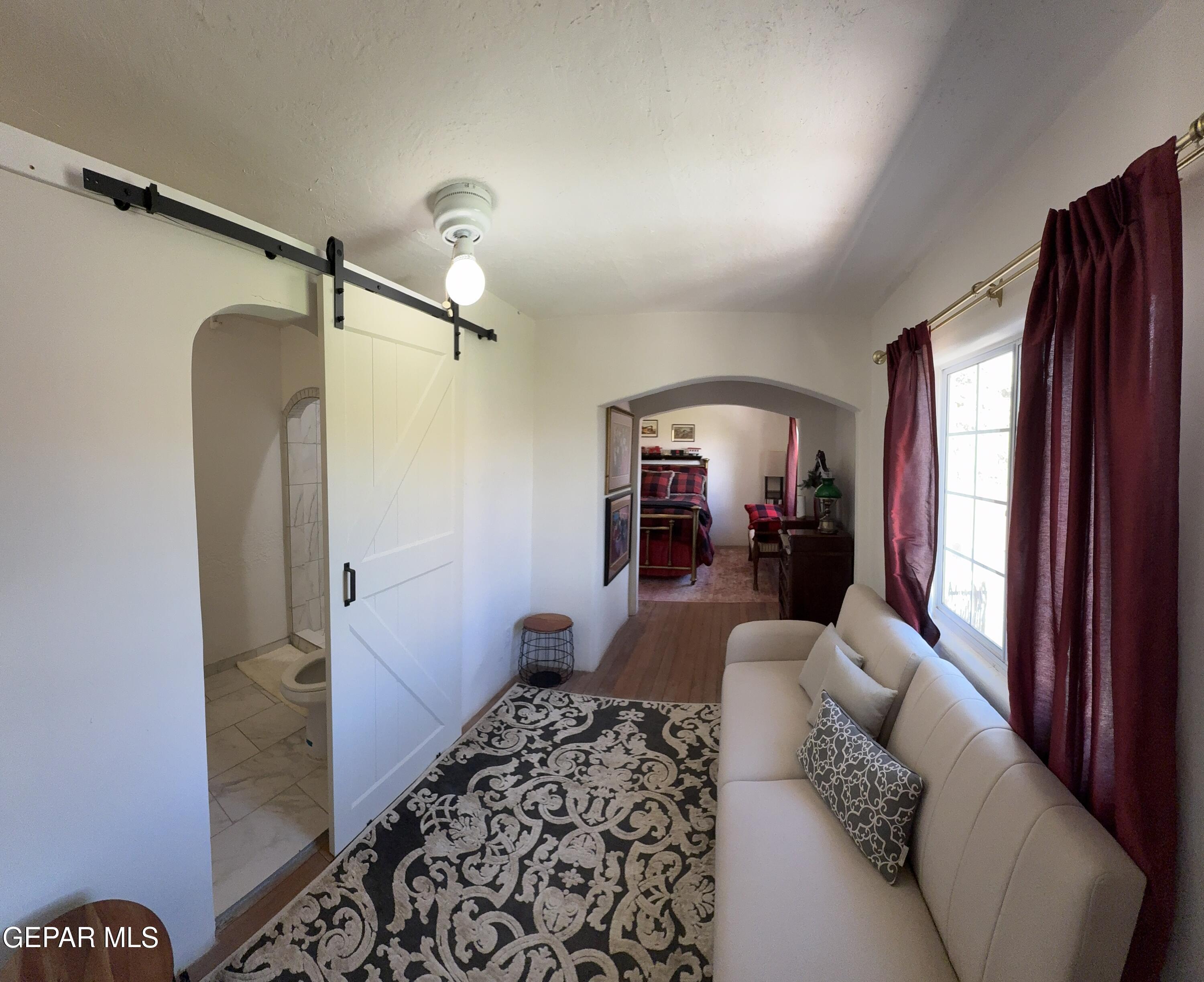 2200 County Rd D061 Las Cruces, NM 88007 - Photo 19 of 38 a living room with furniture and a window