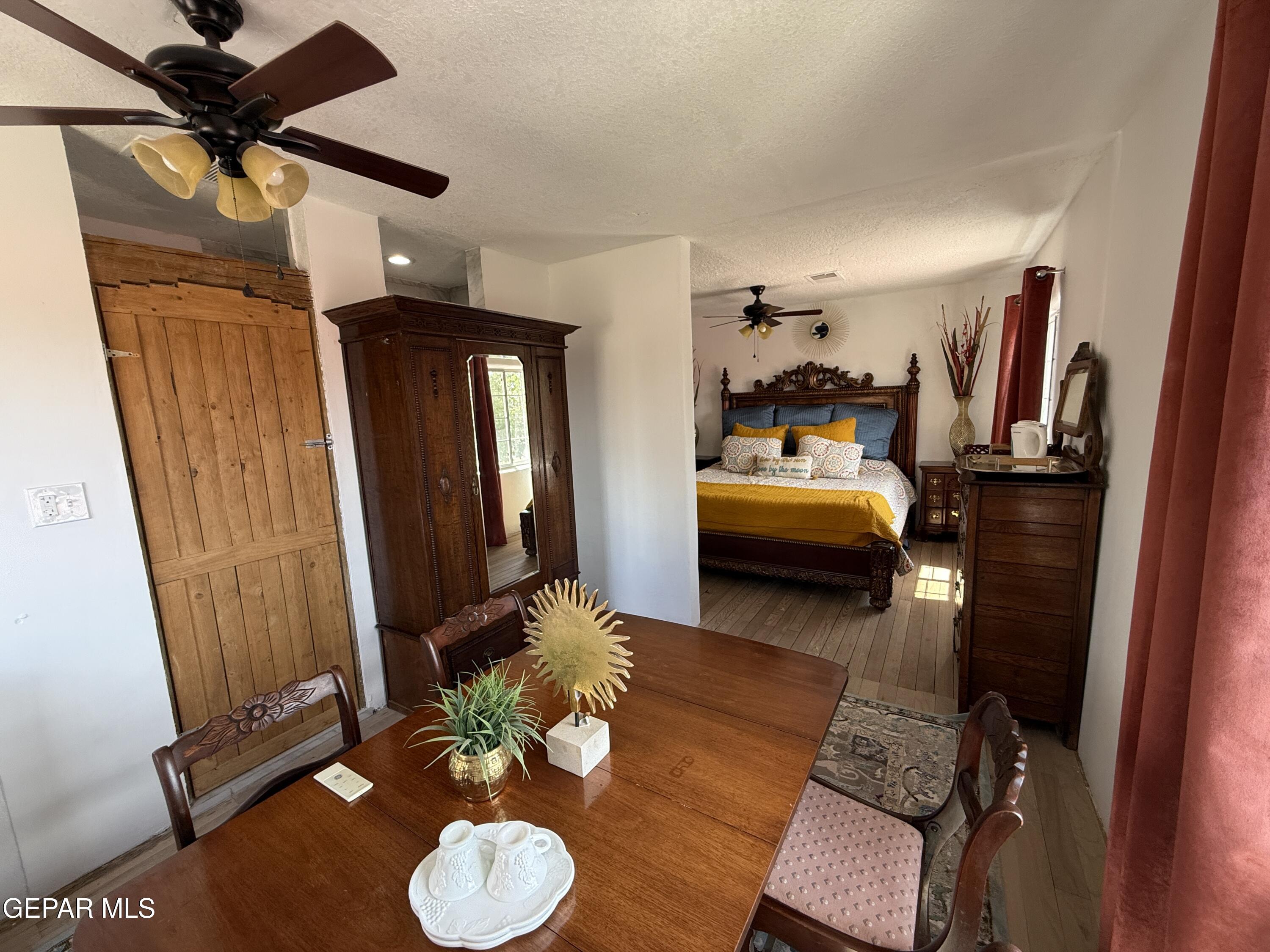 2200 County Rd D061 Las Cruces, NM 88007 - Photo 20 of 38 a bedroom with furniture and a mirror