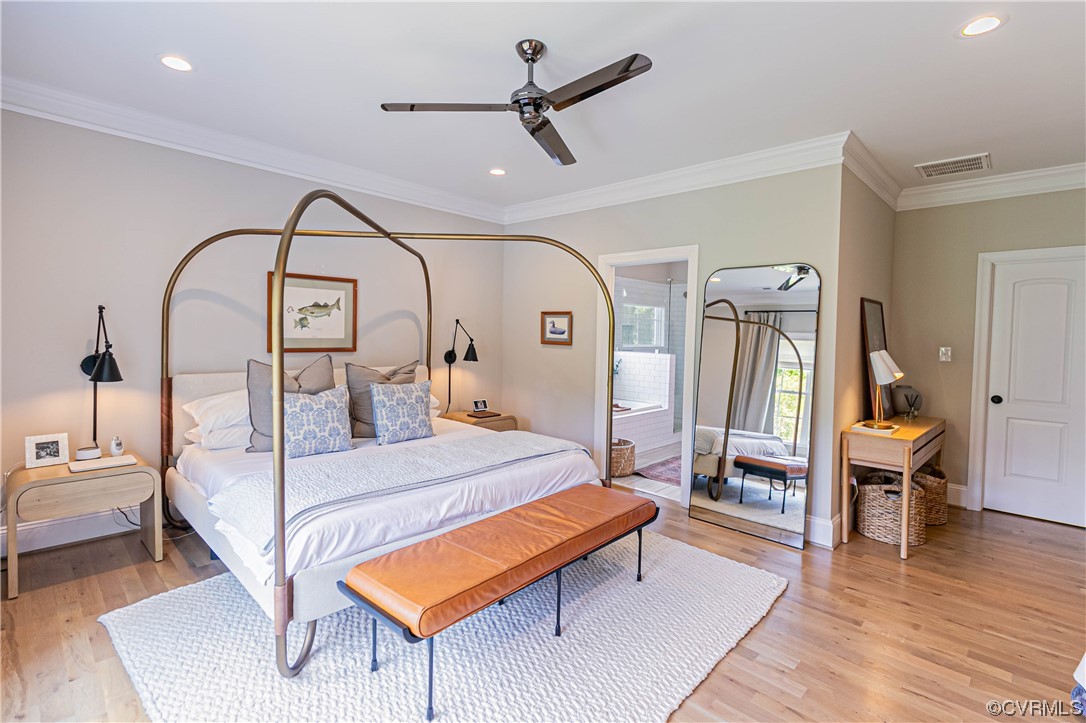 10337 Georgetown Road Mechanicsville, VA 23116 - Photo 24 of 50 Hardwood floored Primary bedroom with a ceiling fan, Huge Walk in Closet and Access to Luxury Bathroom.