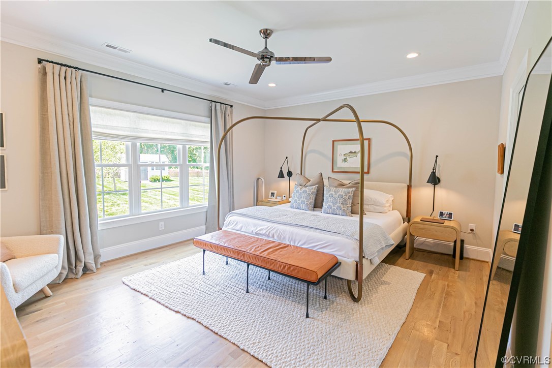 10337 Georgetown Road Mechanicsville, VA 23116 - Photo 27 of 50 Bedroom featuring a ceiling fan, recessed lights, and triple window that gives lots of natural light