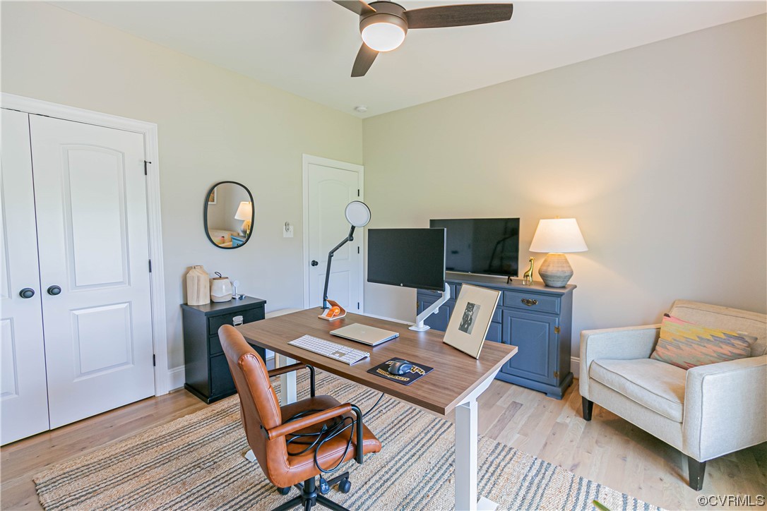 10337 Georgetown Road Mechanicsville, VA 23116 - Photo 33 of 50 Wood floored Bedroom being used as an office featuring a ceiling fan, closet and beautiful hardwood floors.