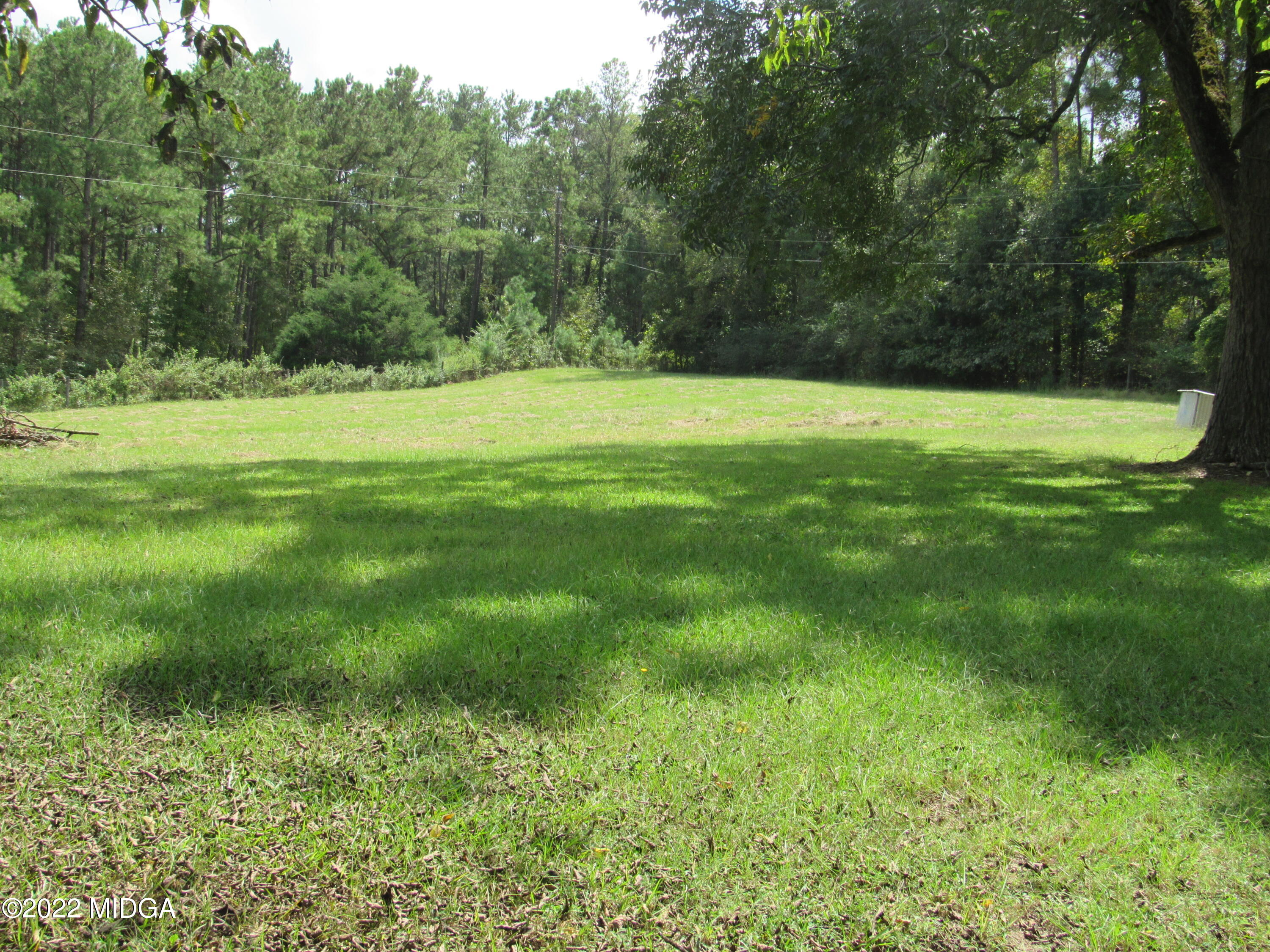 6999 South Rogers Road Macon, GA 31216 - Photo 16 of 61 a view of a green field