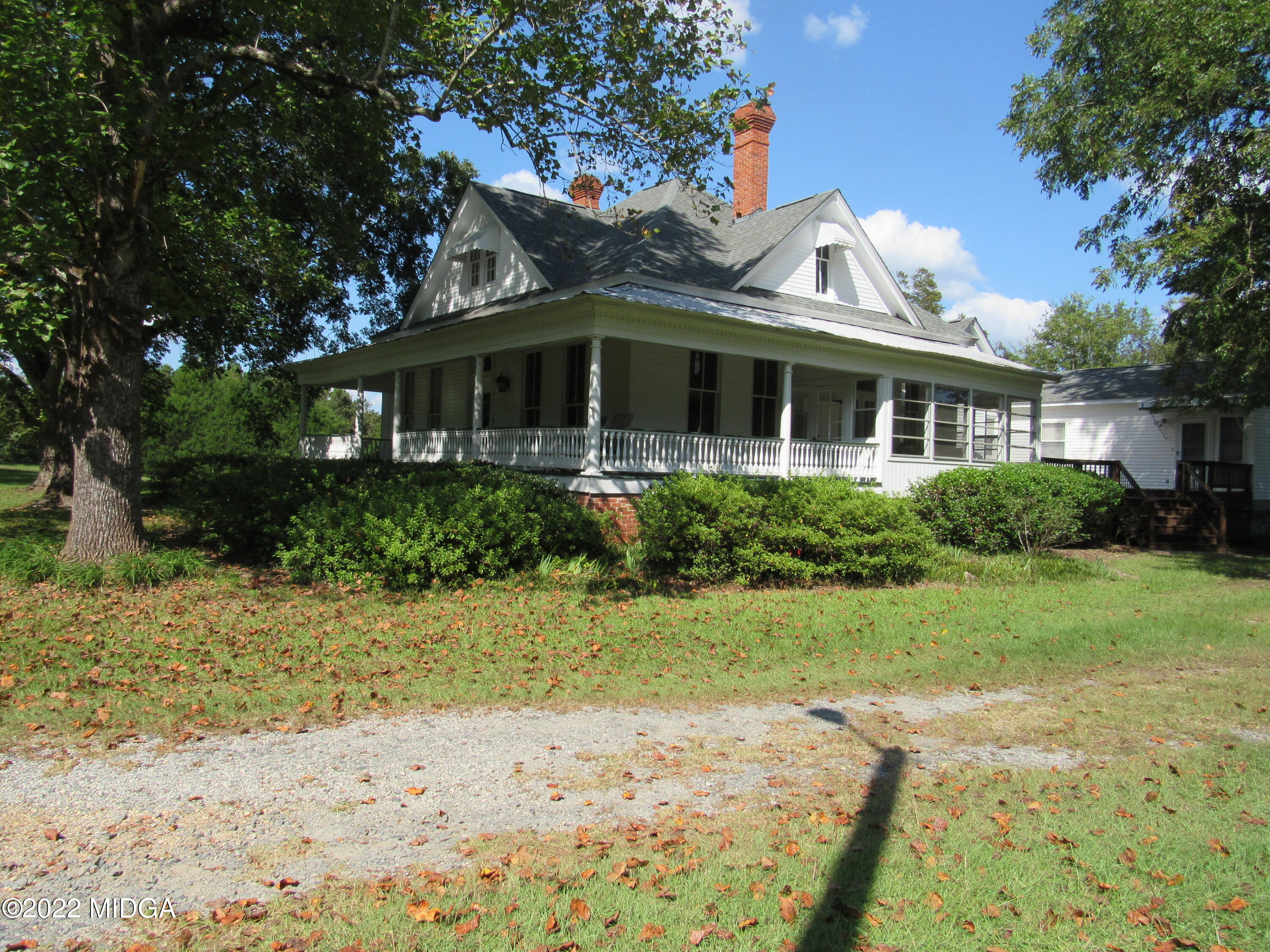 6999 South Rogers Road Macon, GA 31216 - Photo 2 of 61 a front view of a house with a yard
