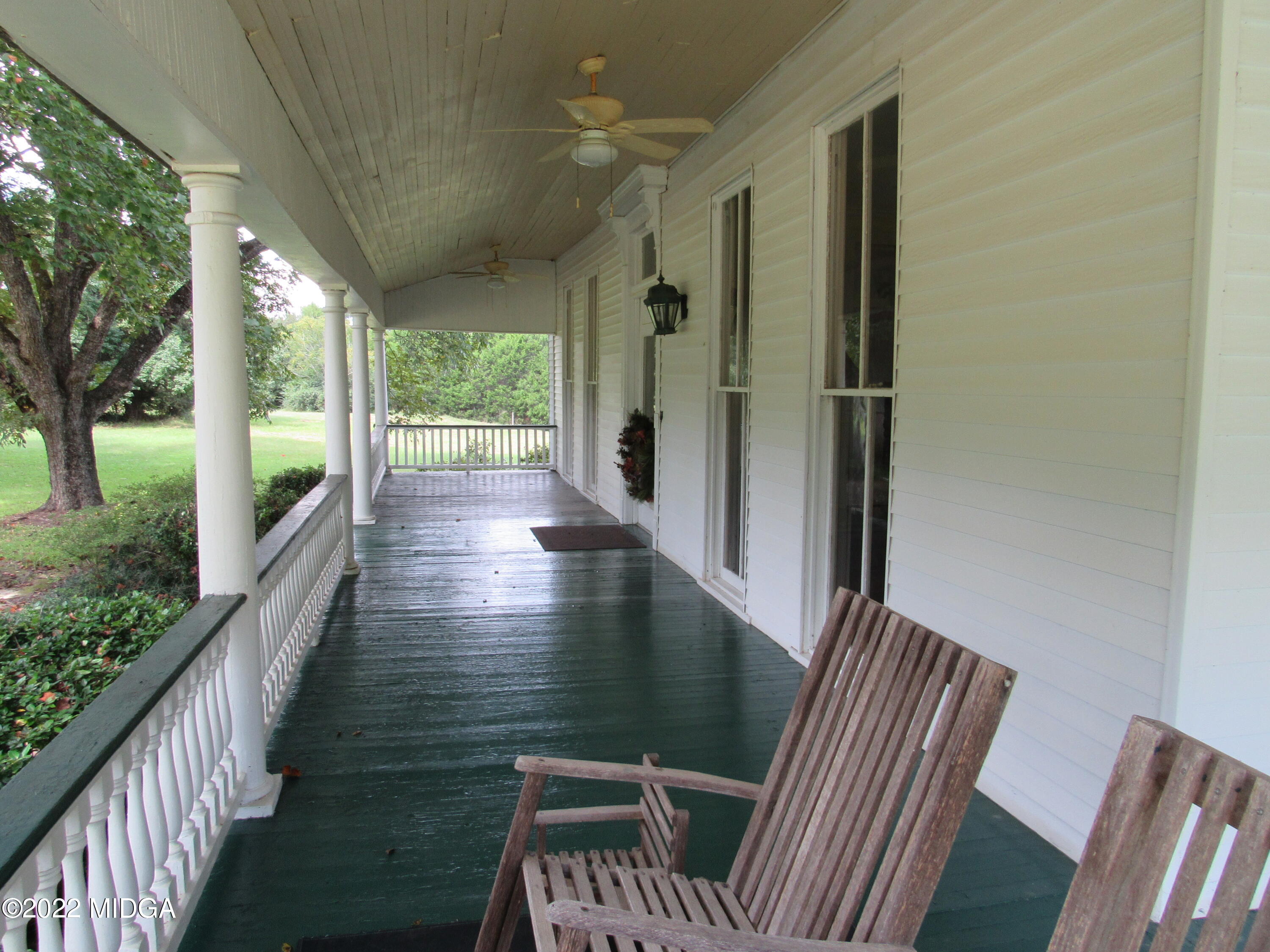 6999 South Rogers Road Macon, GA 31216 - Photo 24 of 61 a view of balcony with wooden floor