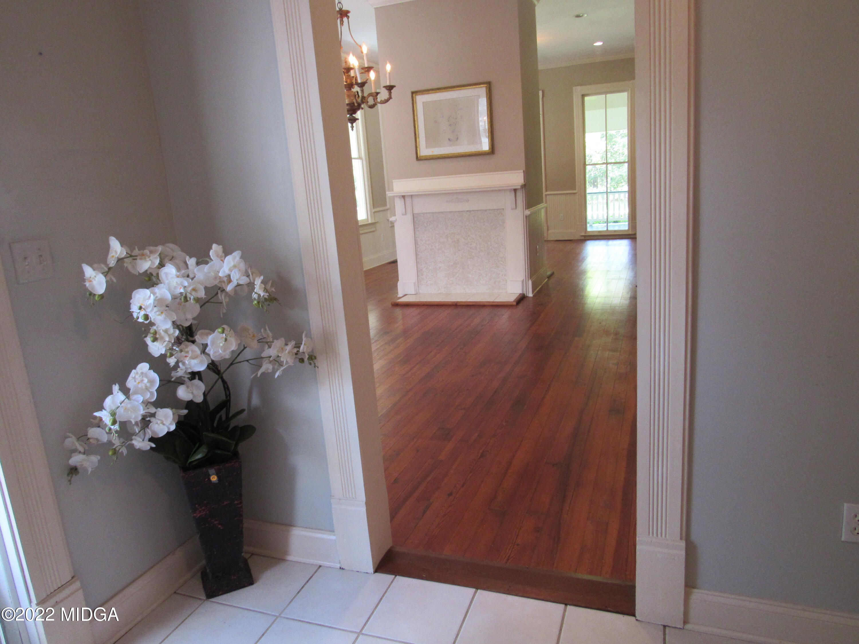 6999 South Rogers Road Macon, GA 31216 - Photo 30 of 61 a view of a hallway with wooden floor