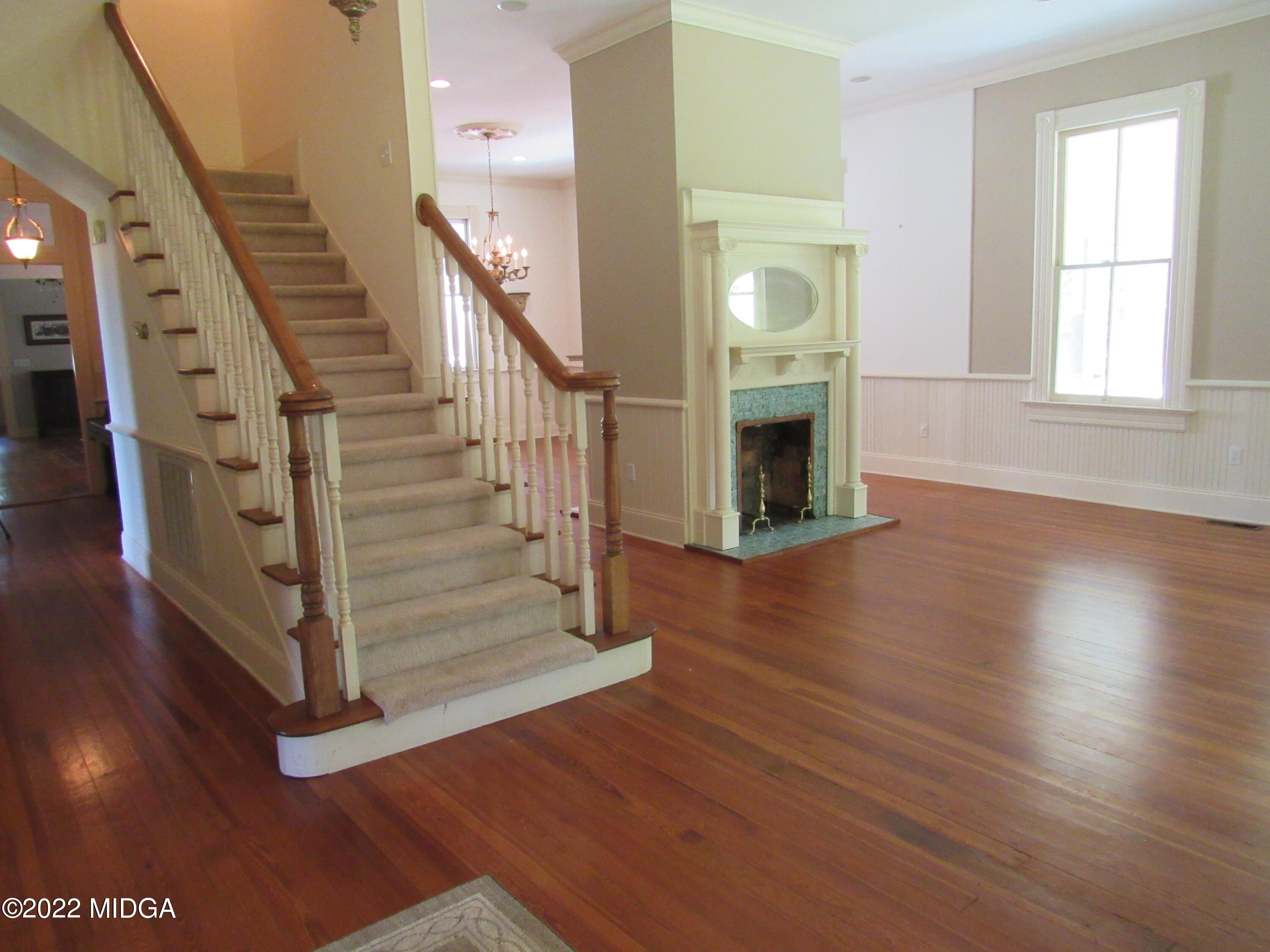 6999 South Rogers Road Macon, GA 31216 - Photo 53 of 61 a view of entryway and hall with wooden floor