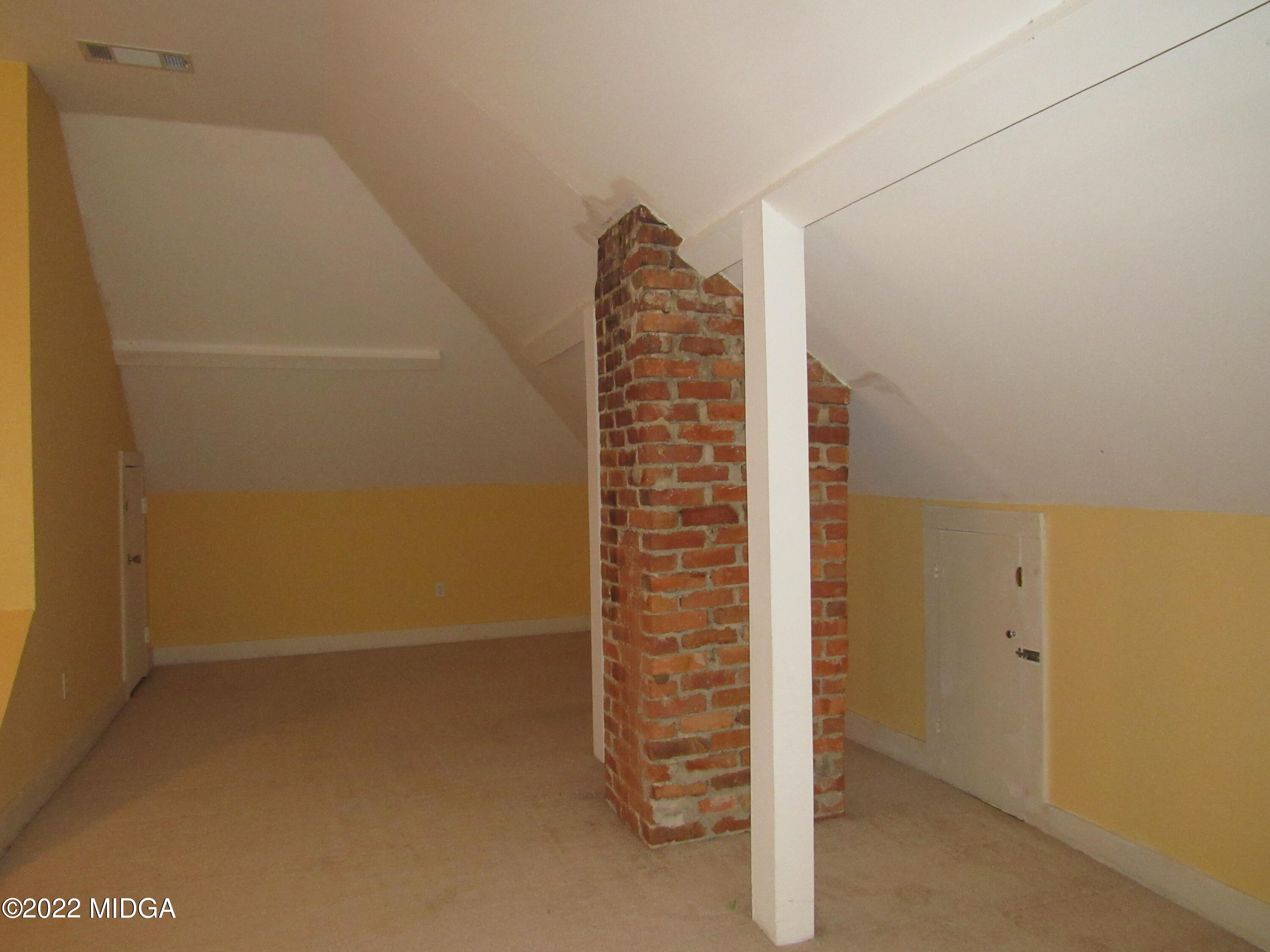 6999 South Rogers Road Macon, GA 31216 - Photo 54 of 61 a view of staircase with white walls