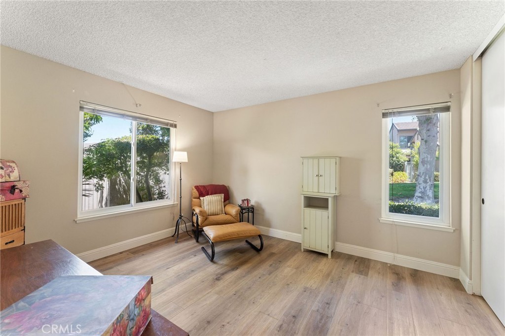 92 Orchard Irvine, CA 92618 - Photo 23 of 46 a living room with furniture and a window