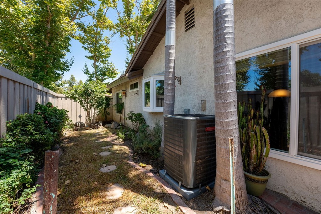 92 Orchard Irvine, CA 92618 - Photo 30 of 46 a view of backyard path with potted plants