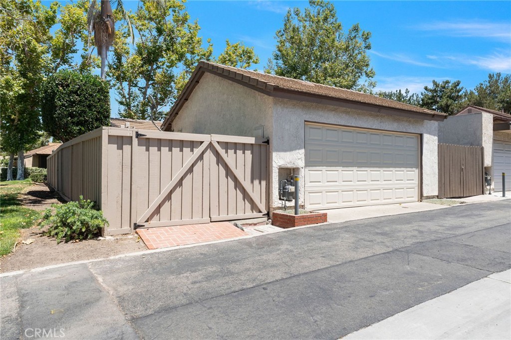 92 Orchard Irvine, CA 92618 - Photo 31 of 46 a view of backyard with small cabin and wooden fence