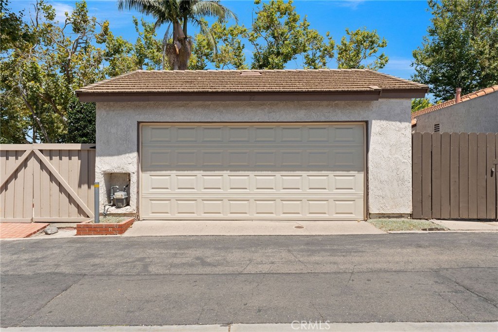 92 Orchard Irvine, CA 92618 - Photo 32 of 46 a front view of a house with a garage
