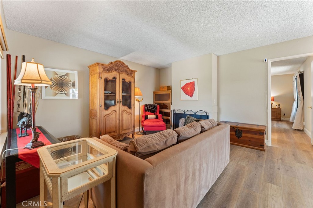 92 Orchard Irvine, CA 92618 - Photo 4 of 46 a living room with furniture and a flat screen tv