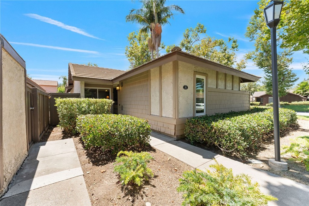 92 Orchard Irvine, CA 92618 - Photo 45 of 46 a front view of a house with a yard