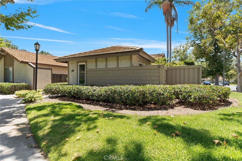92 Orchard Irvine, CA 92618 - Photo 46 of 46 a front view of a house with a yard