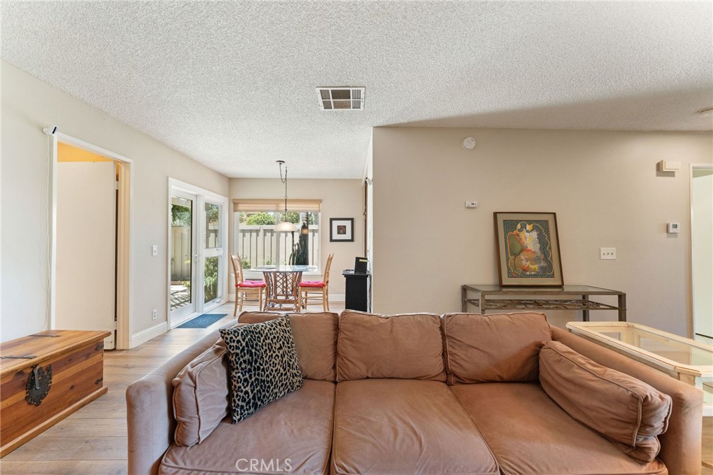 92 Orchard Irvine, CA 92618 - Photo 10 of 46 a living room with furniture and a window