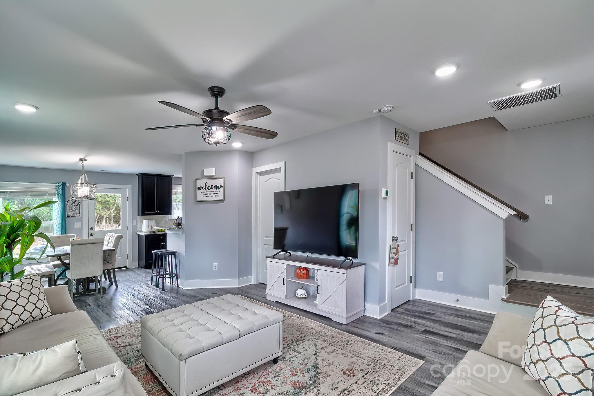 118 Griffin Road Pageland, SC 29728 - Photo 14 of 32 a living room with furniture and a flat screen tv