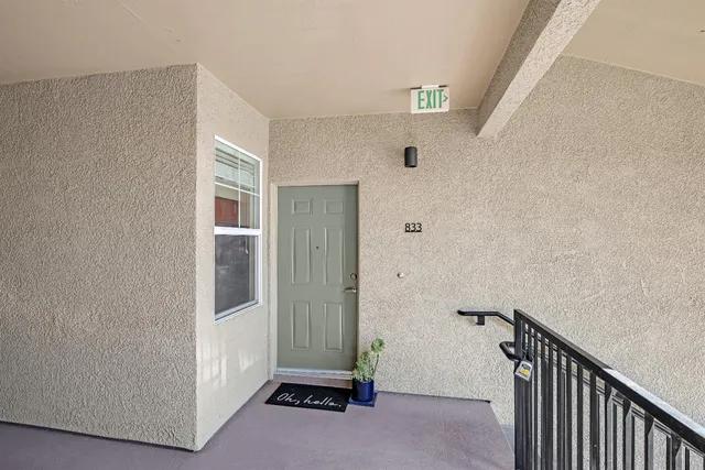 a view of a hallway with closet