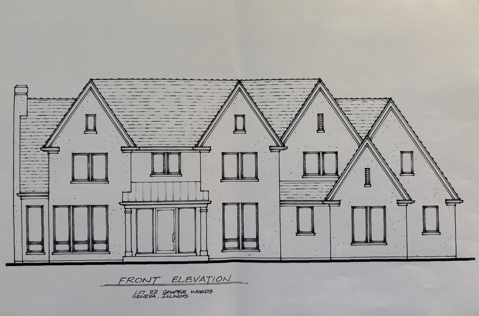 a view of a house with wooden stairs