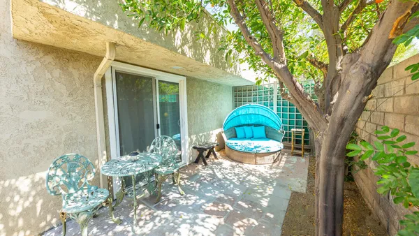 a view of a house with a big yard