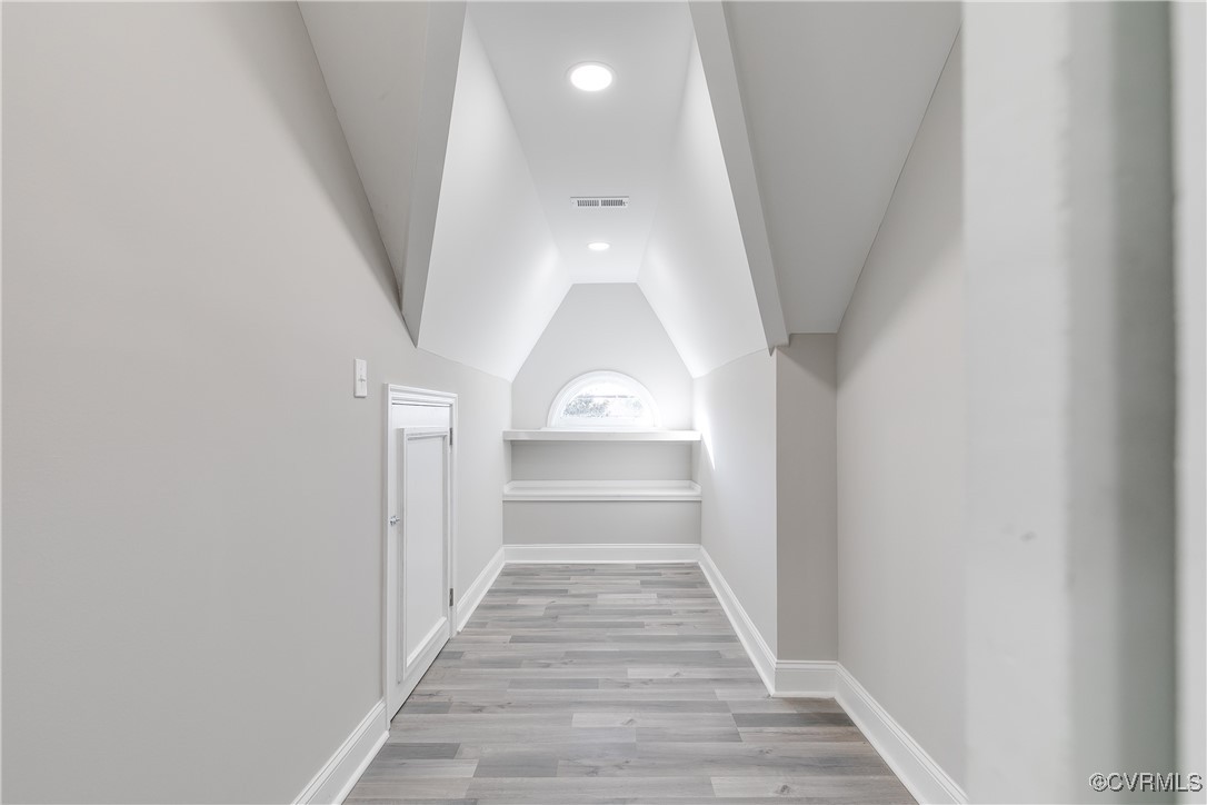 4308 Penick Road Henrico, VA 23228 - Photo 35 of 48 Hallway with light wood-type flooring and lofted c