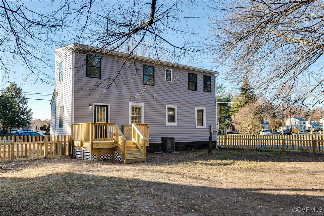 4308 Penick Road Henrico, VA 23228 - Photo 45 of 48 Back of house with a wooden deck, a lawn, and cent