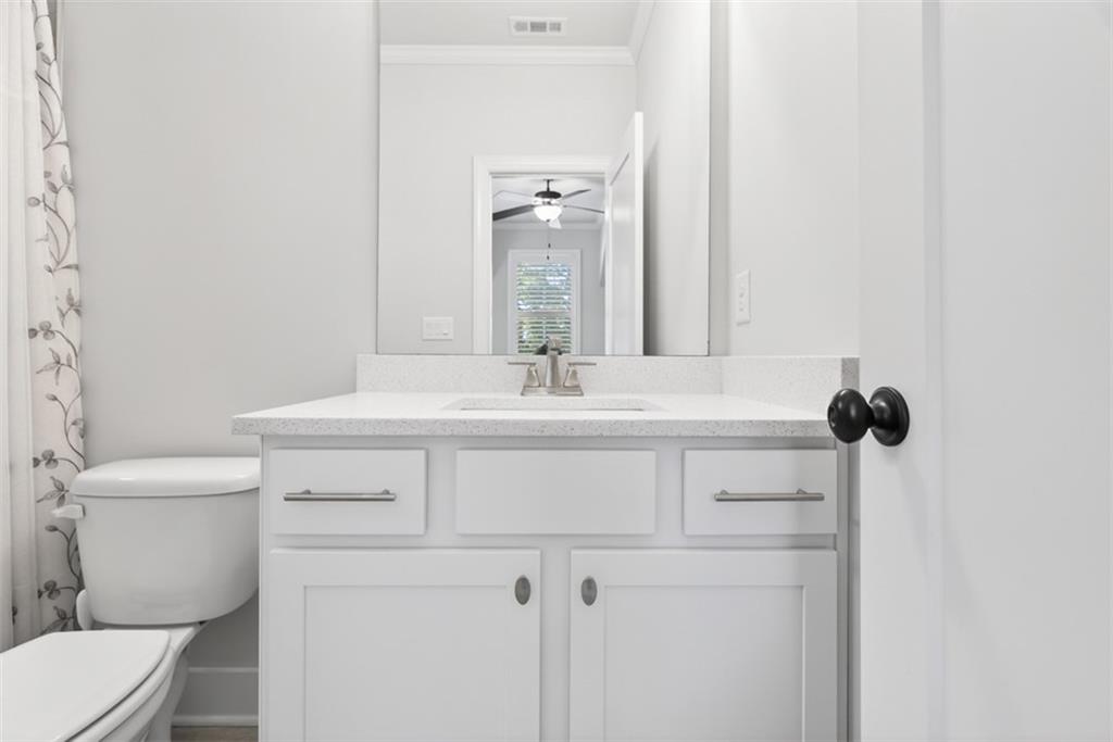 3528 North Bogan Road Buford, GA 30519 - Photo 47 of 79 a bathroom with a sink and a toilet