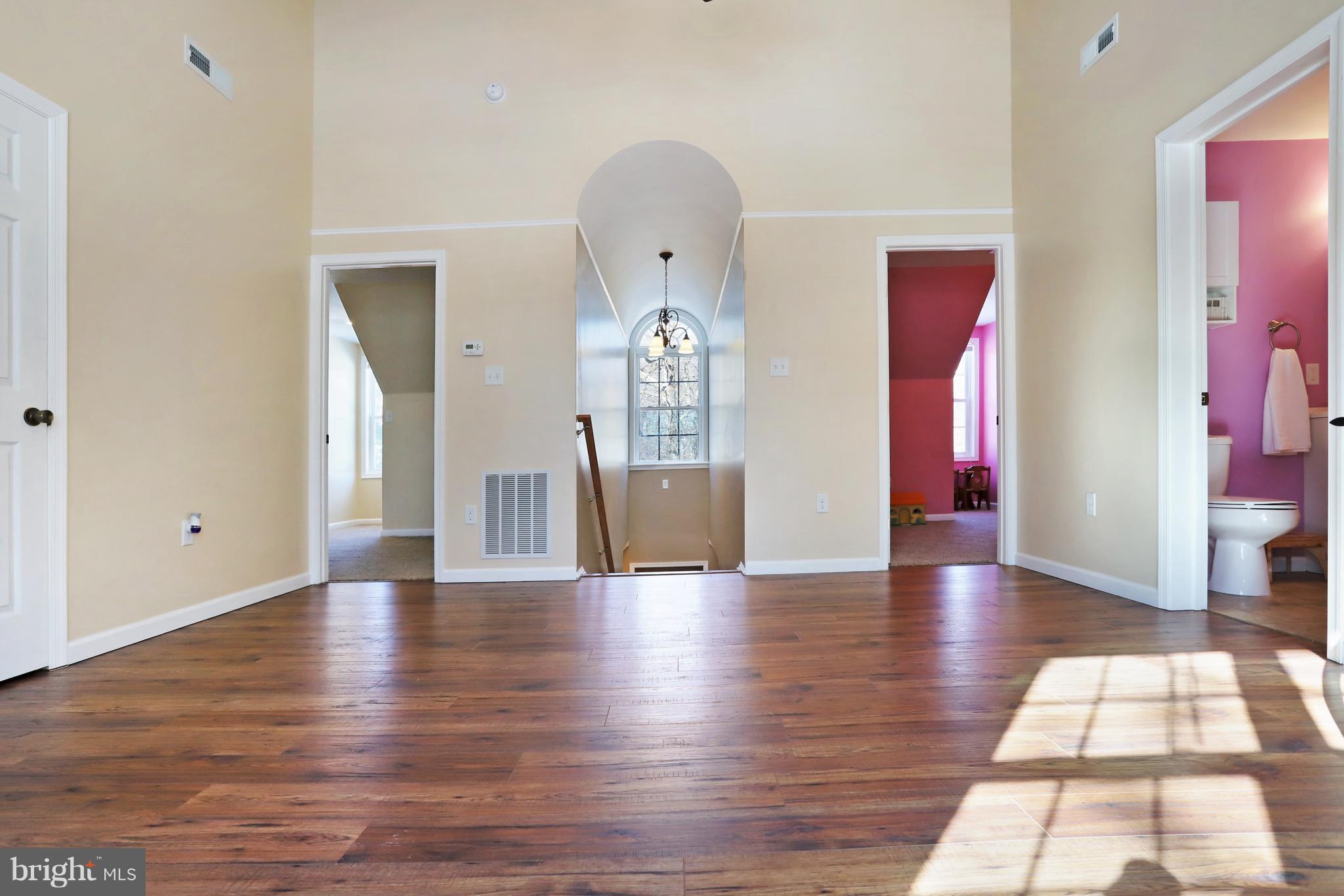 12315 Forrest Hill Road Clear Spring, MD 21722 - Photo 21 of 37 a view of a hallway with wooden floor windows