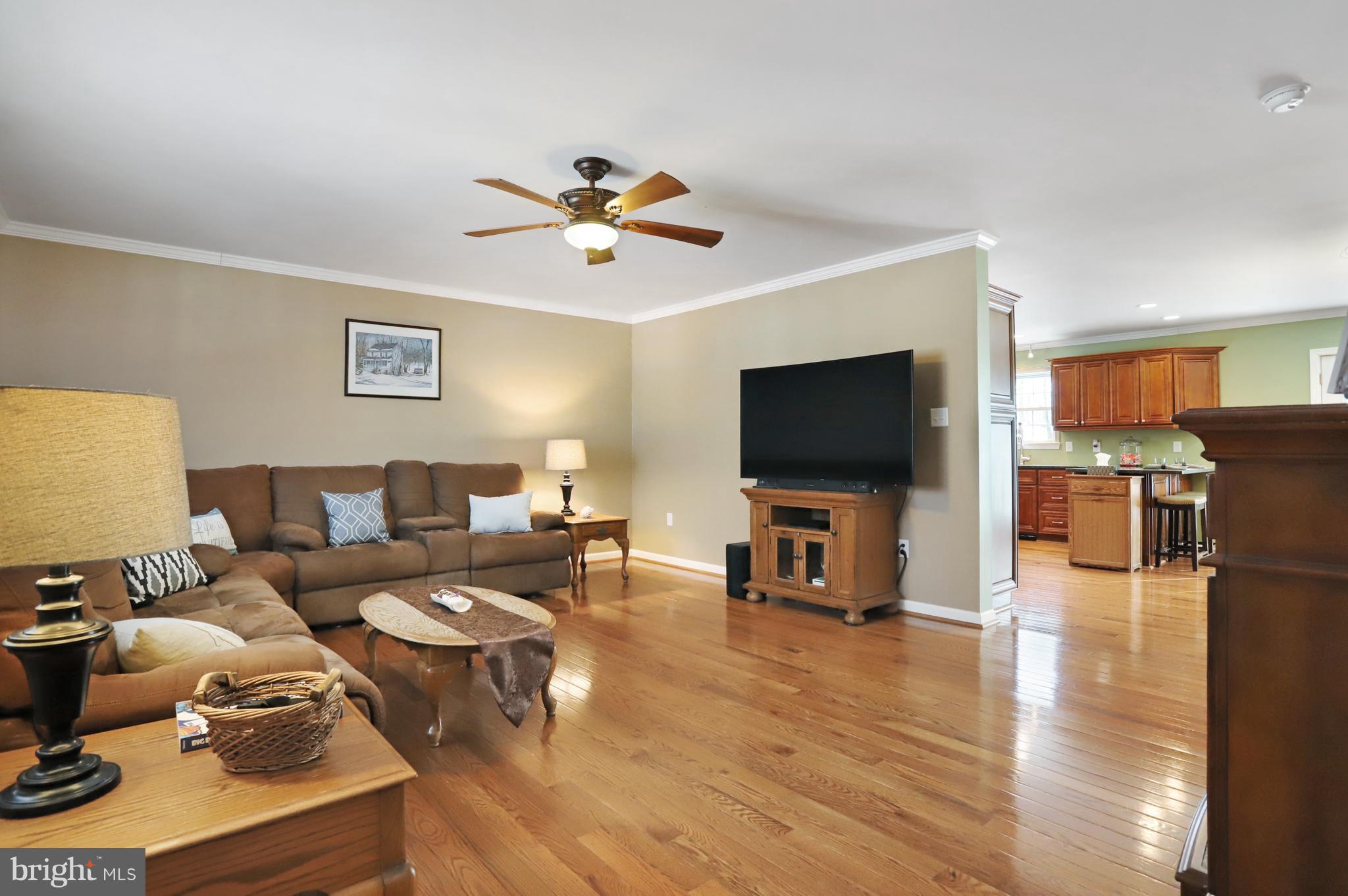 12315 Forrest Hill Road Clear Spring, MD 21722 - Photo 4 of 37 a living room with furniture and a flat screen tv