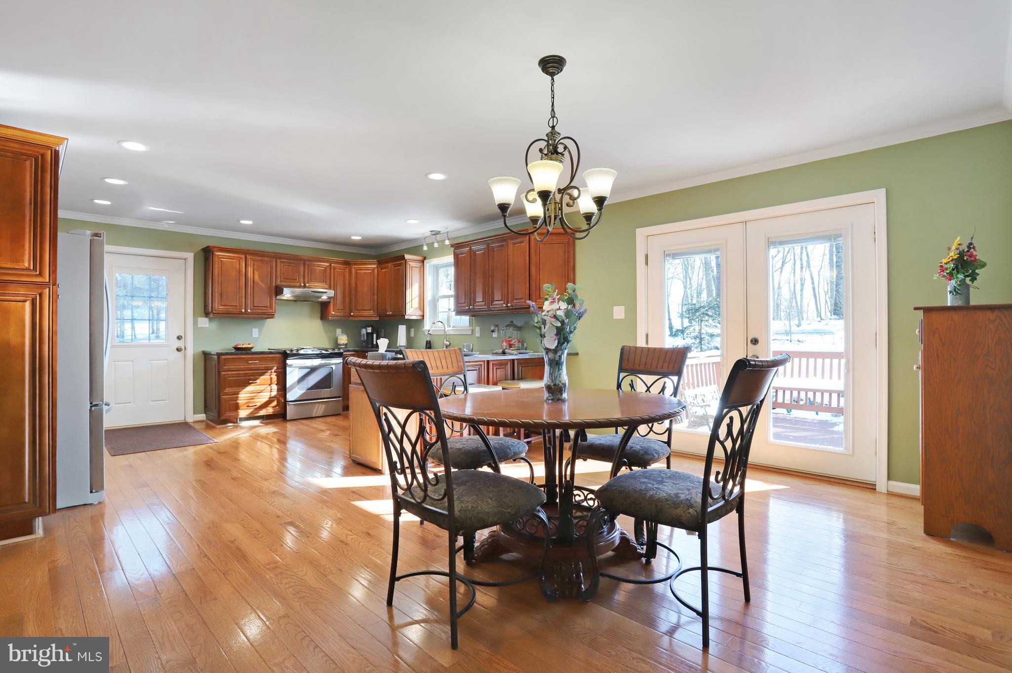12315 Forrest Hill Road Clear Spring, MD 21722 - Photo 7 of 37 a view of a dining room with furniture window and wooden floor